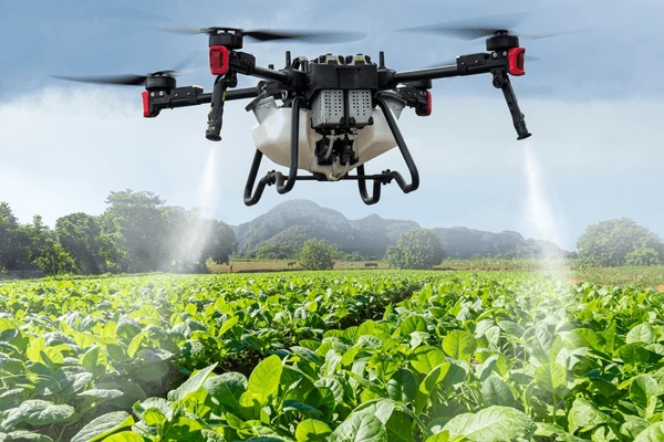 industrial drone on green field 600nw 2472352979